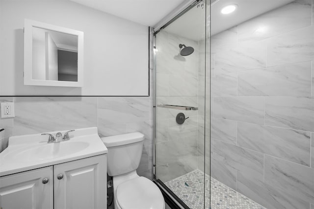 125 Lakewood Dr, Congers, NY 10920 - bathroom with a stall shower, vanity, and tile walls
