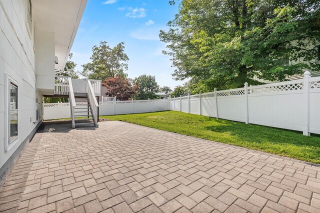125 Lakewood Dr, Congers, NY 10920 - fenced backyard with a patio area and stairs