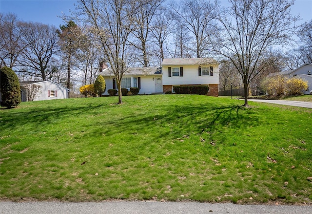 37 Lincoln Dr, Poughkeepsie, NY 12601 - tri-level home featuring brick siding and a front yard