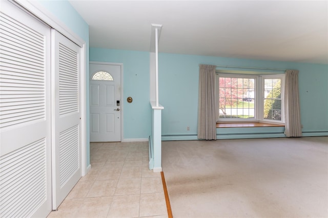 37 Lincoln Dr, Poughkeepsie, NY 12601 - foyer entrance featuring light tile patterned flooring and baseboards