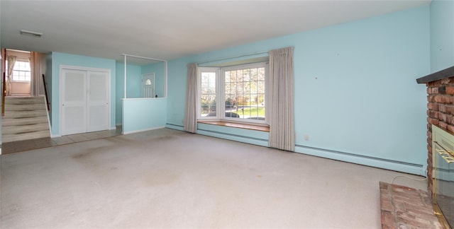 37 Lincoln Dr, Poughkeepsie, NY 12601 - unfurnished living room with a brick fireplace, visible vents, carpet flooring, and baseboards