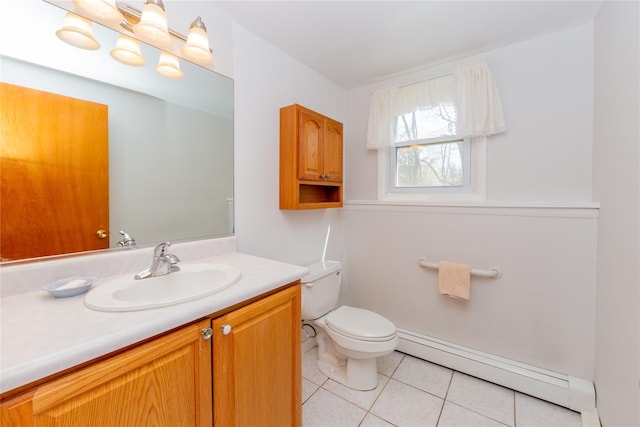 37 Lincoln Dr, Poughkeepsie, NY 12601 - bathroom featuring a baseboard radiator, tile patterned flooring, vanity, and toilet
