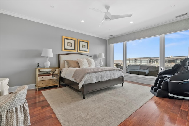 bedroom featuring visible vents, recessed lighting, dark wood-style flooring, and crown molding