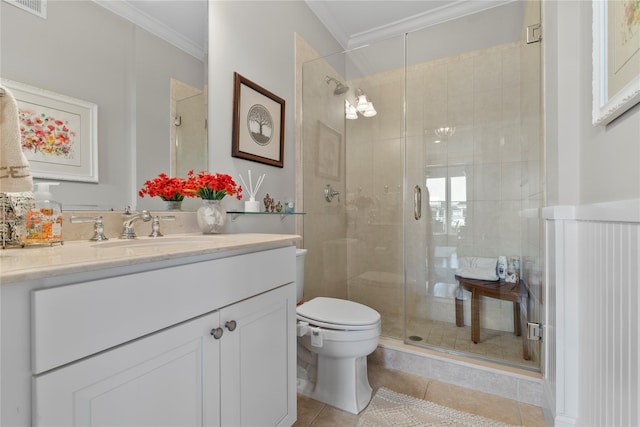 full bath with crown molding, vanity, toilet, tile patterned floors, and a stall shower
