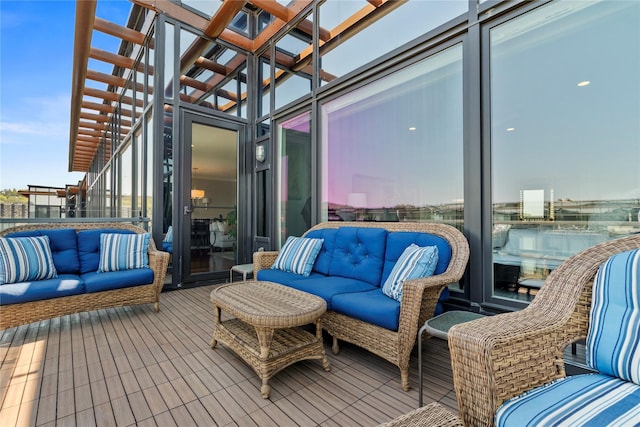 wooden terrace featuring outdoor lounge area