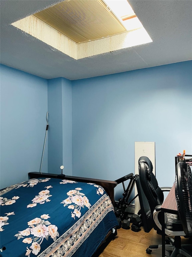 71-15 Sutton Pl Unit 3Fl, Fresh Meadows, NY 11365 - bedroom with wood finished floors and a textured ceiling
