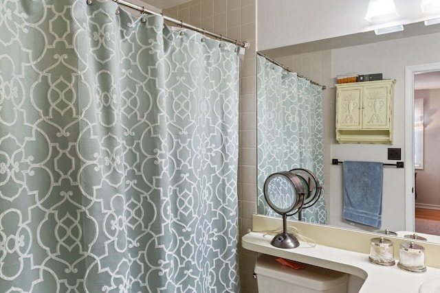 full bath with vanity and a shower with curtain