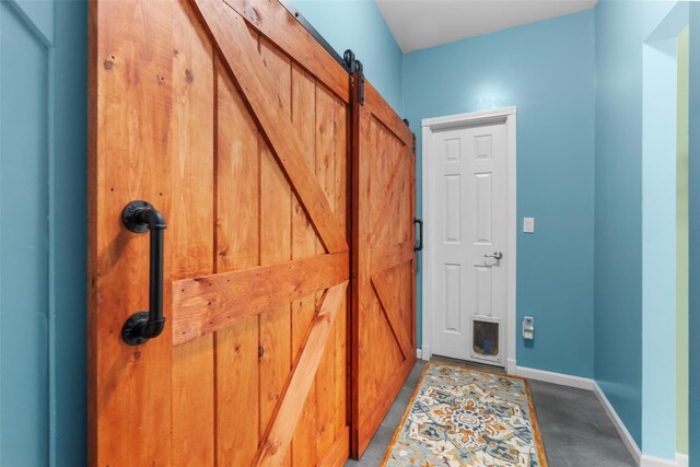 1081 E Mountain Rd S, Cold Spring, NY 10516 - doorway to outside featuring baseboards and a barn door