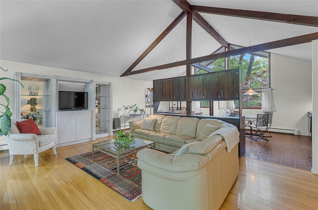 9 Salonga Woods Rd, Northport, NY 11768 - living area featuring beam ceiling, a baseboard heating unit, light wood-type flooring, and high vaulted ceiling