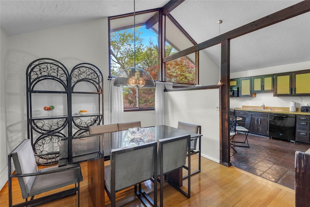 9 Salonga Woods Rd, Northport, NY 11768 - dining area featuring healthy amount of natural light, baseboards, and hardwood / wood-style floors
