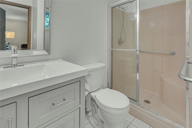 9 Salonga Woods Rd, Northport, NY 11768 - bathroom featuring toilet, a stall shower, vanity, and tile patterned floors