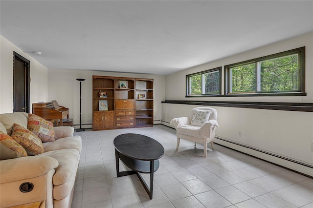 9 Salonga Woods Rd, Northport, NY 11768 - living room featuring a baseboard radiator and light tile patterned flooring