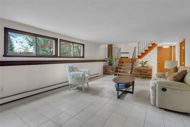 9 Salonga Woods Rd, Northport, NY 11768 - living area featuring baseboard heating, stairway, and light tile patterned floors