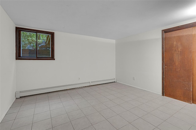 9 Salonga Woods Rd, Northport, NY 11768 - spare room featuring a baseboard radiator and baseboards
