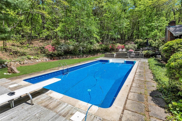 9 Salonga Woods Rd, Northport, NY 11768 - swimming pool featuring a wooden deck and a diving board