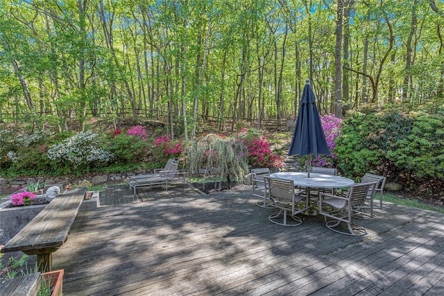 9 Salonga Woods Rd, Northport, NY 11768 - wooden terrace with outdoor dining area