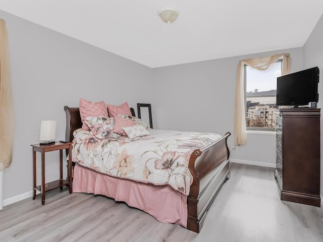 270 N Broadway Unit 6H, Yonkers, NY 10701 - bedroom featuring baseboards and wood finished floors