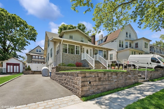 66 Vernon Ave, Mount Vernon, NY 10553 - traditional-style house with an outbuilding and stone siding