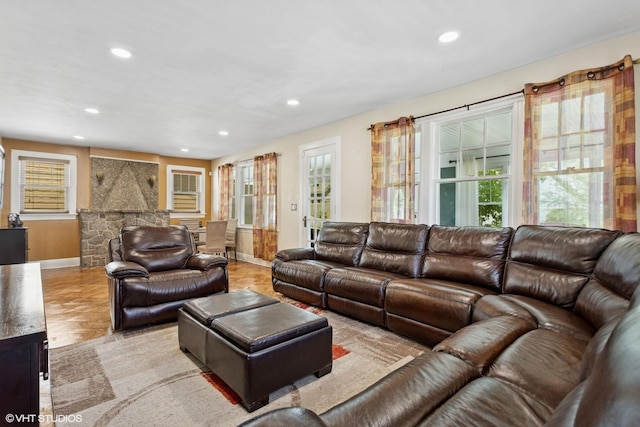 66 Vernon Ave, Mount Vernon, NY 10553 - living area featuring baseboards, recessed lighting, healthy amount of natural light, a fireplace, and light wood-type flooring