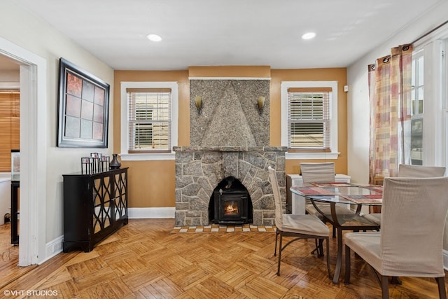 66 Vernon Ave, Mount Vernon, NY 10553 - dining room with baseboards, plenty of natural light, recessed lighting, and a stone fireplace