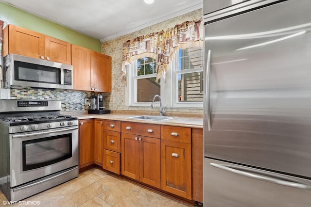 66 Vernon Ave, Mount Vernon, NY 10553 - kitchen with appliances with stainless steel finishes, a sink, light countertops, brown cabinets, and tasteful backsplash