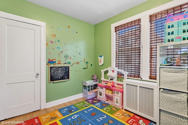 66 Vernon Ave, Mount Vernon, NY 10553 - rec room with light wood-type flooring and baseboards
