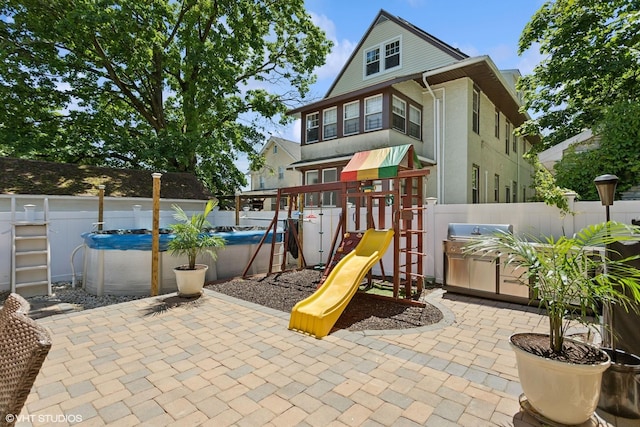66 Vernon Ave, Mount Vernon, NY 10553 - view of jungle gym featuring a fenced backyard