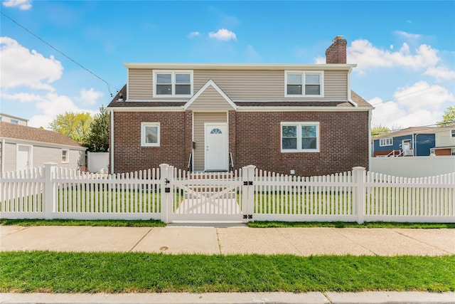 bungalow featuring a gate, brick siding, a chimney, and a fenced front yard