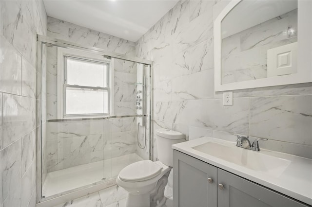 full bathroom featuring toilet, a marble finish shower, marble finish floor, and tile walls