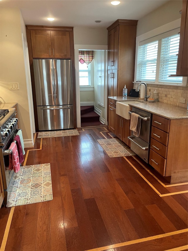 20815 38th Ave, Bayside, NY 11361 - kitchen with appliances with stainless steel finishes, a sink, dark wood-type flooring, baseboards, and recessed lighting