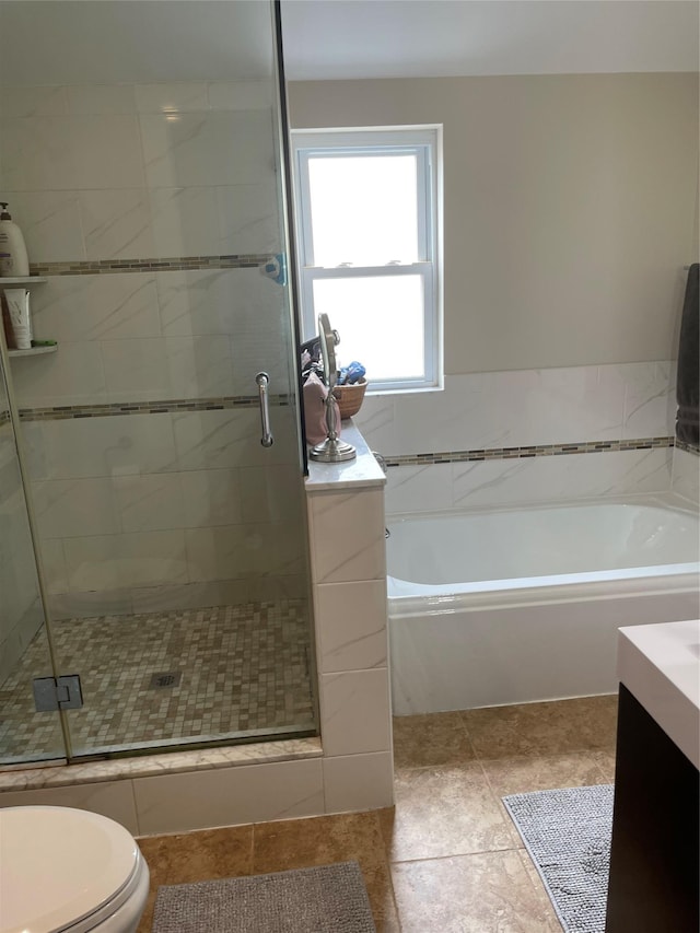 20815 38th Ave, Bayside, NY 11361 - bathroom featuring a bath, a shower stall, toilet, tile patterned floors, and vanity