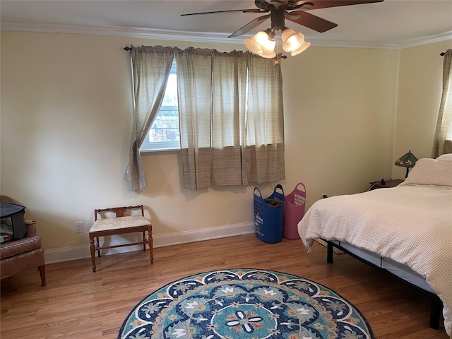 20815 38th Ave, Bayside, NY 11361 - bedroom featuring crown molding, wood finished floors, baseboards, and ceiling fan