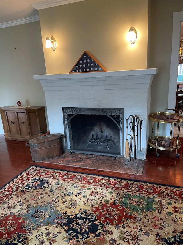 20815 38th Ave, Bayside, NY 11361 - detailed view of a fireplace, wood finished floors, and crown molding
