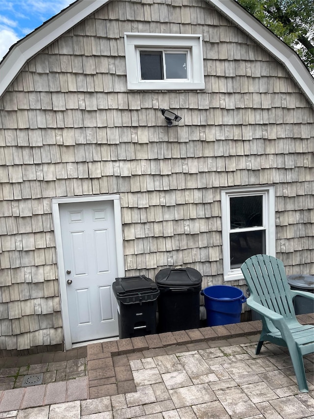 20815 38th Ave, Bayside, NY 11361 - rear view of house featuring a patio