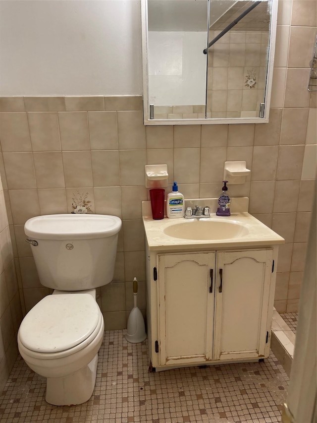 20815 38th Ave, Bayside, NY 11361 - bathroom featuring vanity, tile walls, toilet, and tile patterned flooring