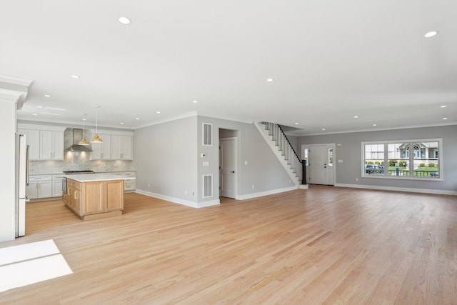 44 Harbor Hills Dr, Port Washington, NY 11050 - unfurnished living room featuring crown molding, recessed lighting, and visible vents