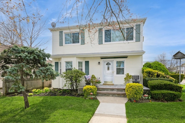 186 Stuart Rd, Valley Stream, NY 11581 - colonial inspired home with a front yard and fence