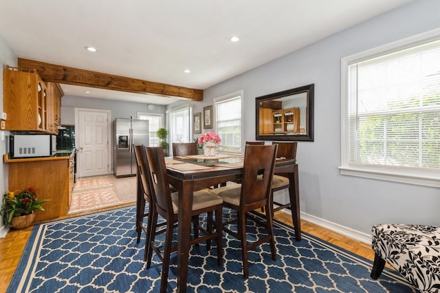 186 Stuart Rd, Valley Stream, NY 11581 - dining room featuring plenty of natural light, beam ceiling, baseboards, and recessed lighting