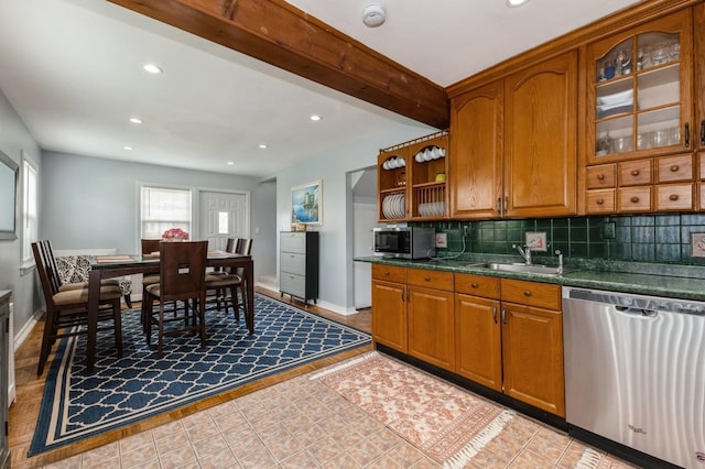 186 Stuart Rd, Valley Stream, NY 11581 - kitchen with backsplash, appliances with stainless steel finishes, dark countertops, and recessed lighting
