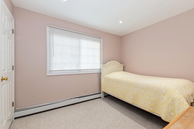 186 Stuart Rd, Valley Stream, NY 11581 - bedroom featuring a baseboard radiator and recessed lighting