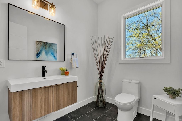 123 N Riverside Ave, Croton-On-Hudson, NY 10520 - bathroom featuring tile patterned flooring, baseboards, toilet, and vanity