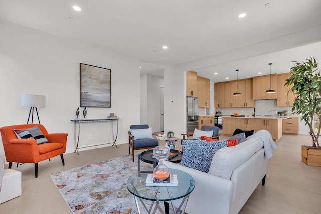 123 N Riverside Ave, Croton-On-Hudson, NY 10520 - living room featuring baseboards and recessed lighting