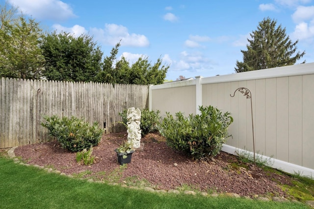 view of yard with a fenced backyard