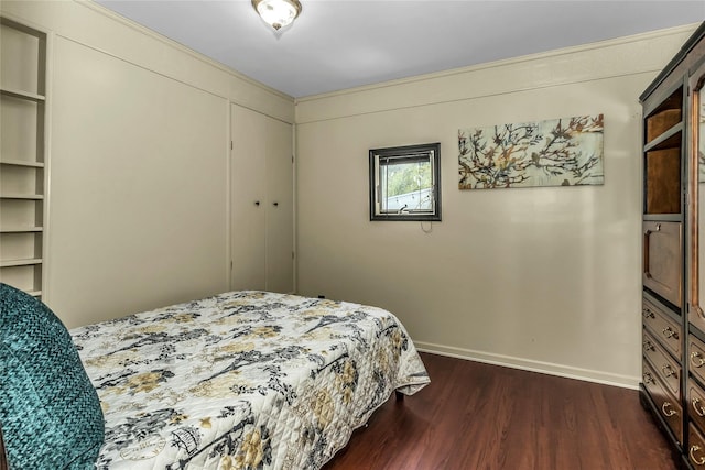 118 Noel Dr, Centereach, NY 11720 - bedroom featuring baseboards and dark wood-style flooring