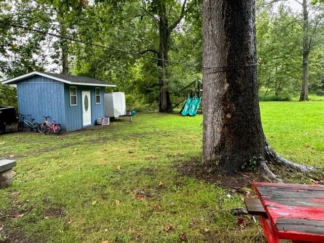 7 Ash St, New Windsor, NY 12553 - view of green lawn with a playground