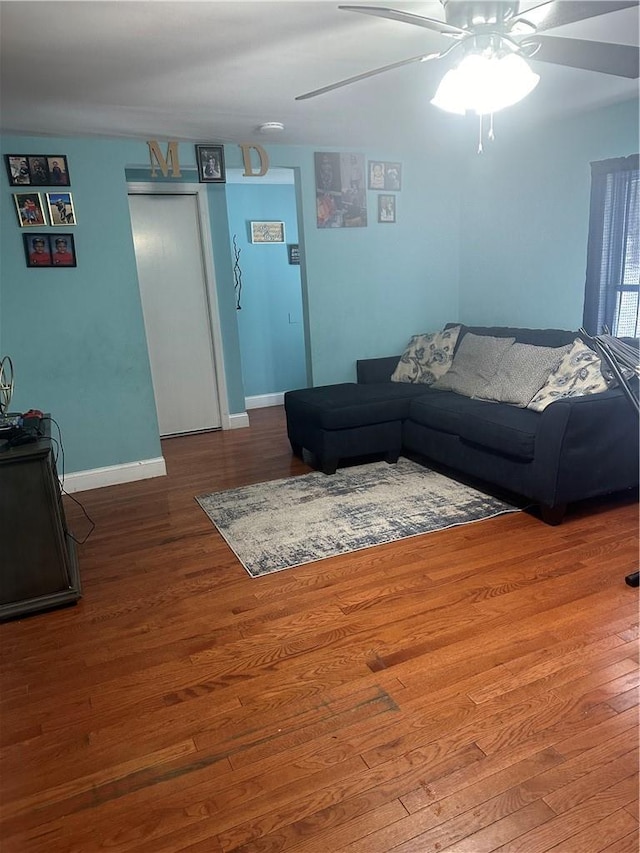 7 Ash St, New Windsor, NY 12553 - living area featuring wood finished floors, a ceiling fan, and baseboards