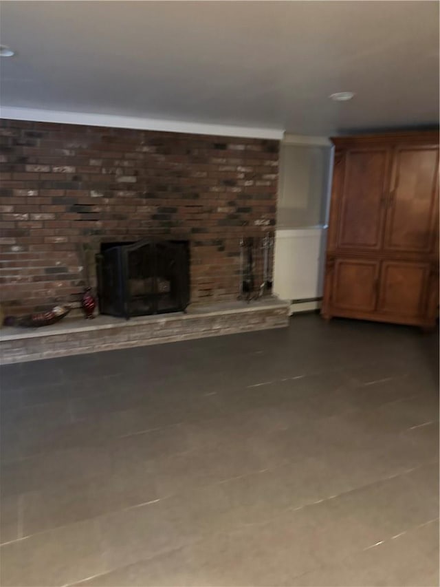 7 Ash St, New Windsor, NY 12553 - unfurnished living room with dark tile patterned flooring, baseboard heating, and a fireplace
