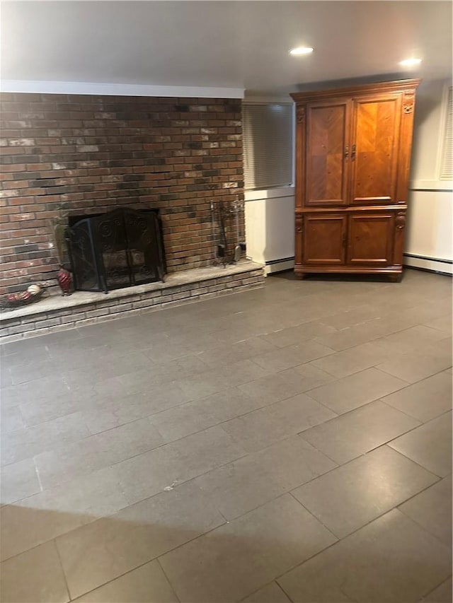 7 Ash St, New Windsor, NY 12553 - unfurnished living room with a baseboard heating unit, ornamental molding, and a fireplace