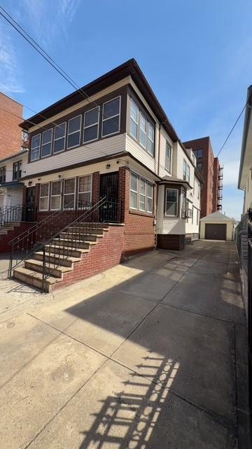 exterior space featuring brick siding