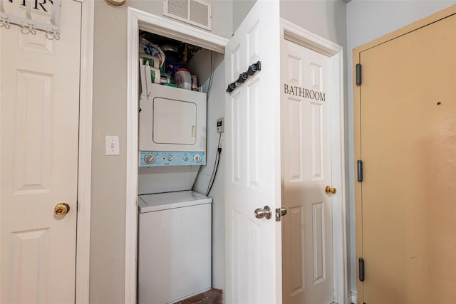 175-26 89th Ave Unit D, Jamaica, NY 11432 - washroom featuring laundry area, visible vents, and stacked washer / dryer